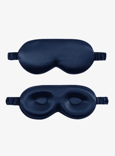 To mørkeblå silkesovemasker, den ene sett forfra og den andre fra innsiden med to formede øyekopper